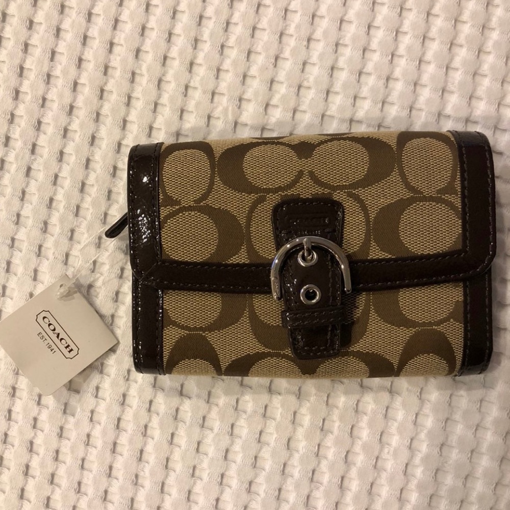 Coach tri-state wallet.